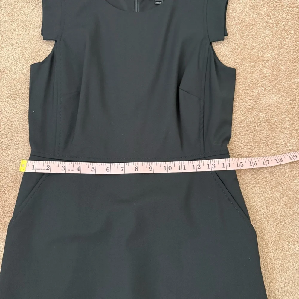 J. Crew Elegant Black Resume Dress. Pockets, back vent and zipper. Sleeveless.